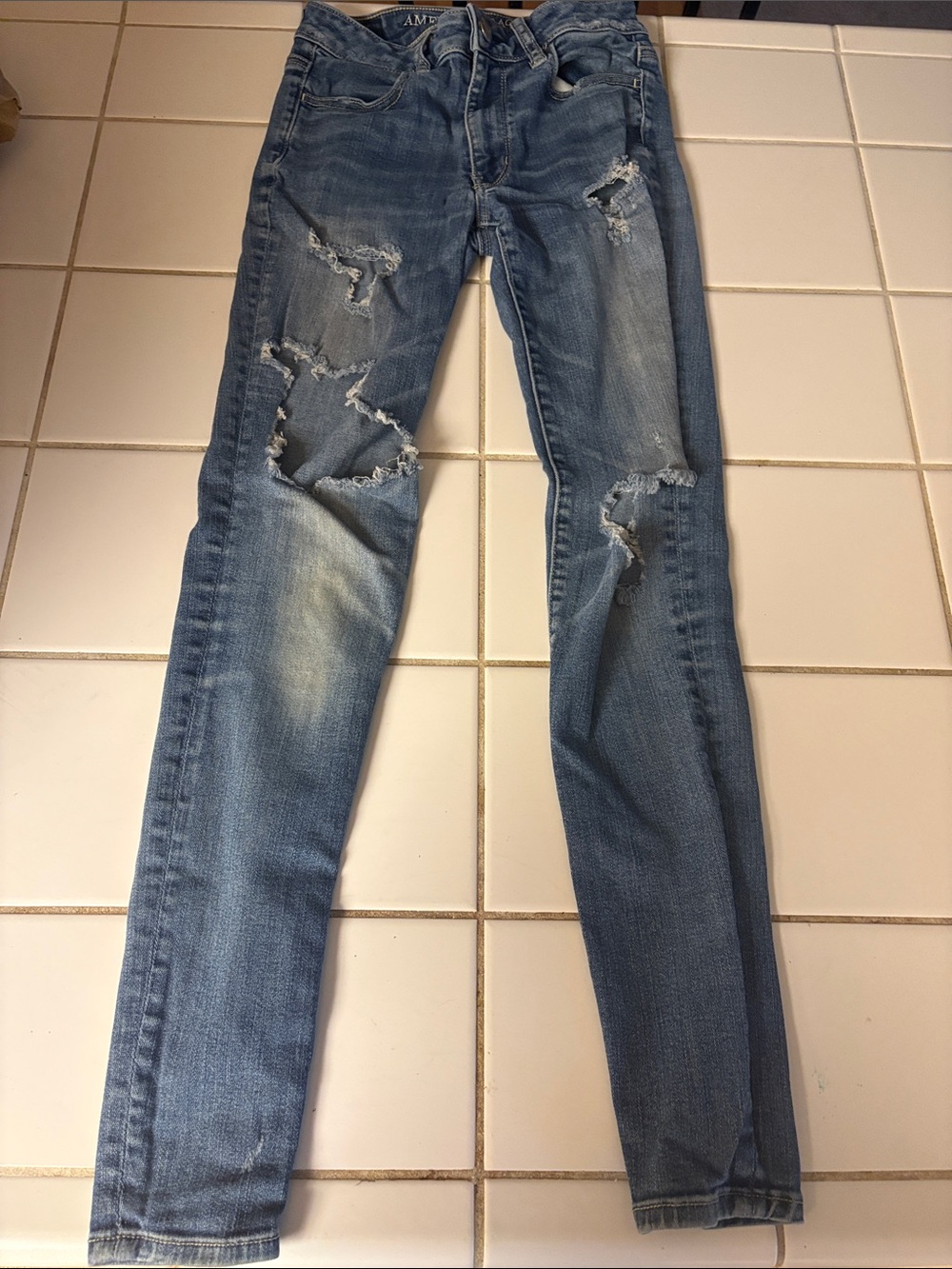 American Eagle Outfitters Light Blue Distressed Skinny Jeans